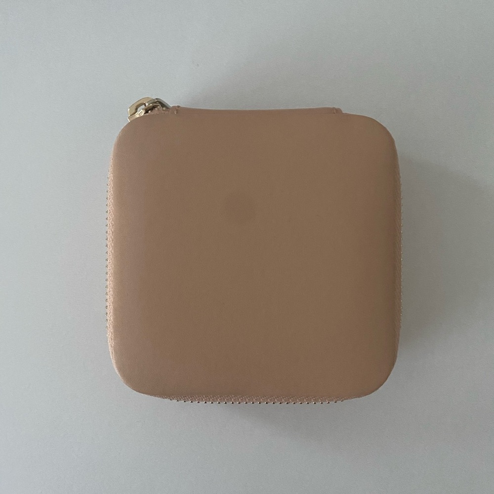 Mejuri travel jewelry case in beige leather